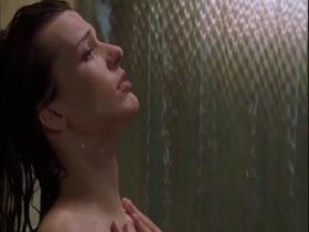 Milla Jovovich gets Kissed in the Shower 12