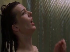 Milla Jovovich gets Kissed in the Shower 16