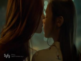 Dominique Provost-Chalkley & Katherine Barrell kissing, Lesbian in Wynonna Earp 10