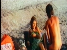 Ornella Mutiin beach , nude scene in Il Sole Nella Pelle 10
