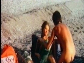 Ornella Mutiin beach , nude scene in Il Sole Nella Pelle 4