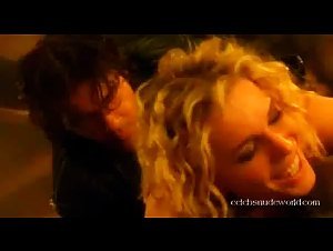 Rebecca Romijn Kissing , Blonde in Femme Fatale (2002) 11