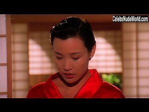 Joan Chen nude, boobs scene in Hunted (1995) 15