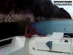 Pamela Anderson relaxing topless in a boat in Pam & Tommy Lee sex tape (1998) 17