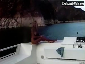 Pamela Anderson relaxing topless in a boat in Pam & Tommy Lee sex tape (1998) 19