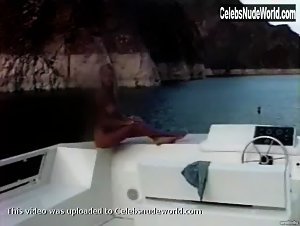 Pamela Anderson relaxing topless in a boat in Pam & Tommy Lee sex tape (1998) 20