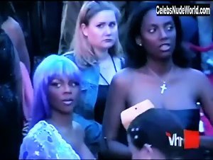 Lil' Kim Nude, breasts scene in VH1's 100 Greatest Red Carpet Moments (2004) 1