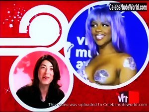 Lil' Kim Nude, breasts scene in VH1's 100 Greatest Red Carpet Moments (2004) 14
