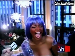 Lil' Kim Nude, breasts scene in VH1's 100 Greatest Red Carpet Moments (2004) 9