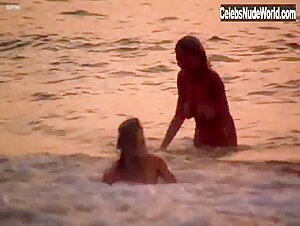 Dona Speir Public Nudity , Explicit in Savage Beach (1989) 13