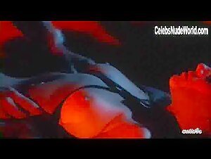 Lana Clarkson boobs , Nipple in Deathstalker (1983) 7