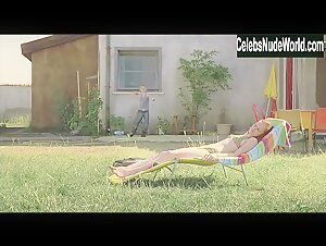 Adelaide Leroux Sunbathing , Topless in Home (2008) 2