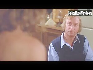 Annie McEnroe breasts, bush scene in The Hand (1981) 11