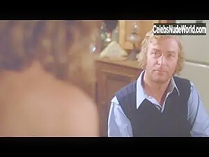 Annie McEnroe breasts, bush scene in The Hand (1981) 12