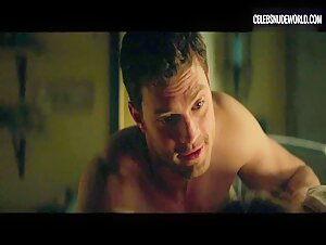 Dakota Johnson Cuddling, Breasts scene in Fifty Shades Darker (2017) 9